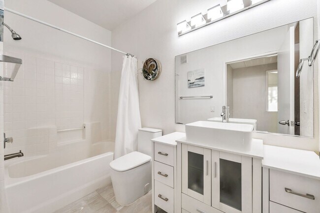 Building Photo - Modern Gated Condo with Upgraded Interior and Attached Garage in Prime South Las Vegas Location!