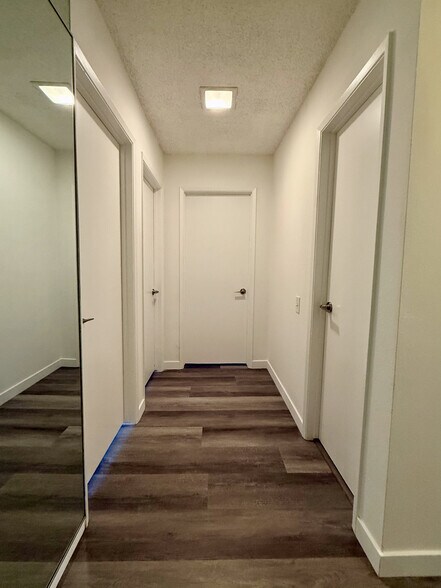 Upstairs hallway with shared bathroom on the right - 3500 W Manchester Blvd