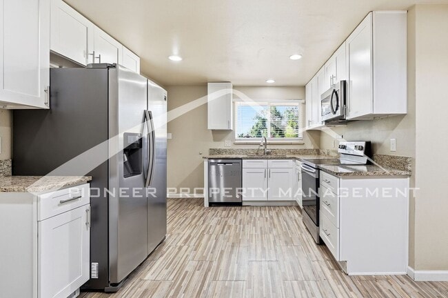 Building Photo - Spacious Home with Washer/Dryer and Storage Shed