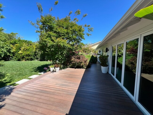 Building Photo - UPDATED THREE BEDROOM TWO BATH ONE-LEVEL EAST CORTE MADERA HOME WITH STUNNING OUTDOOR SPACE