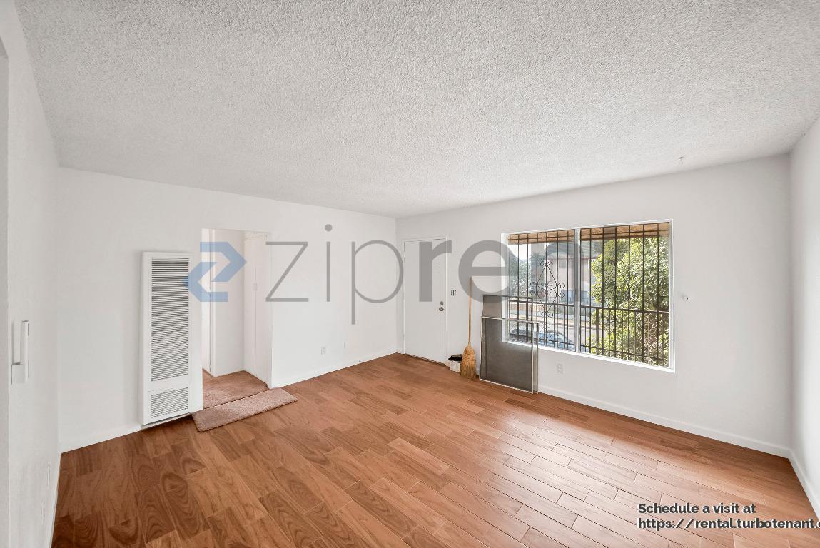 Building Photo - 2458 Normandie Ave