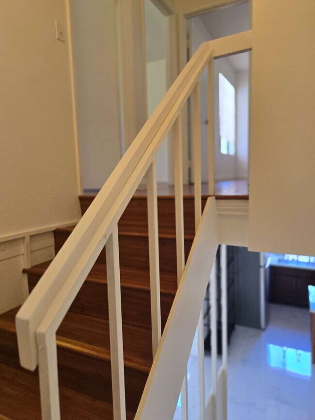 Building Photo - A spacious 3-bed, 2-bath condo is convenie...