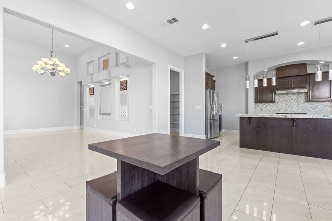 Building Photo - Canyon Falls Single-Story: Chef’s Kitchen, Office + Built-In BBQ Yard (3-Car)