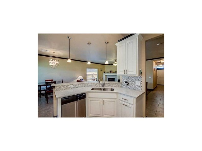 Building Photo - Contemporary Home + Wood Floors + Storm Shelter + Edmond Schools