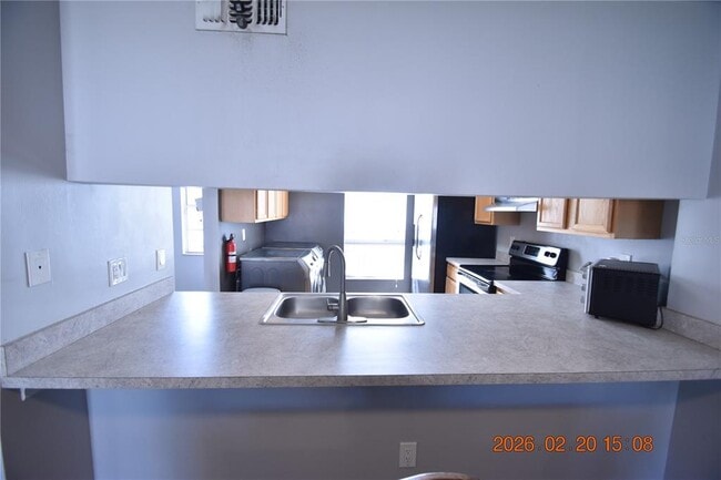 Building Photo - 5106 Sunridge Palms Dr