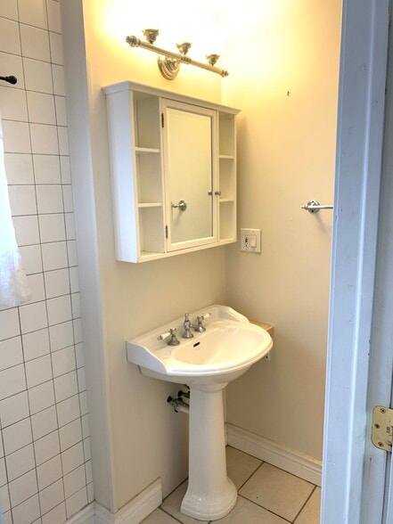 Small bath with tile shower - 22 Lyon St