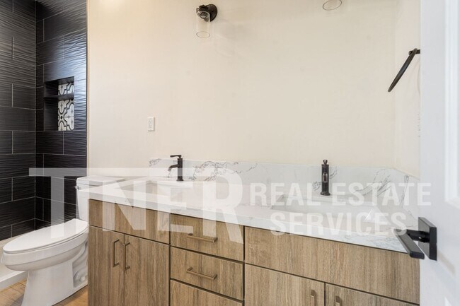 Building Photo - Elegant Modern Living