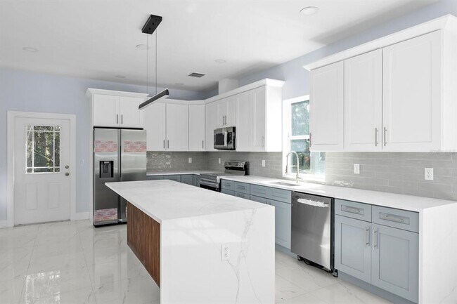 Building Photo - 8119 N Dakota Ave