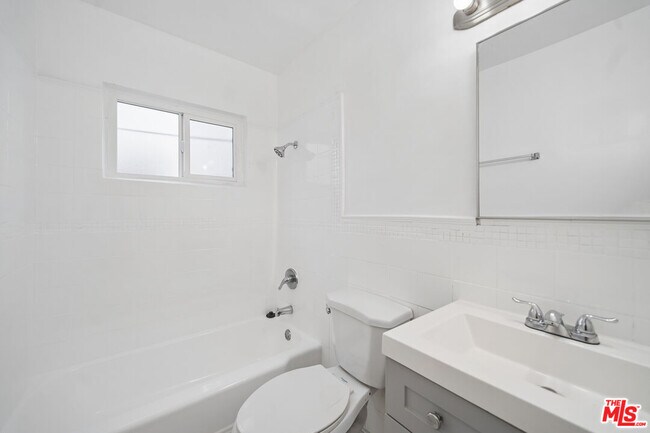 Building Photo - 7209 Willoughby Ave