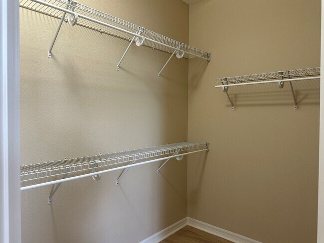 Building Photo - Top Floor Condo at Lakeside at Lakes of Wi...