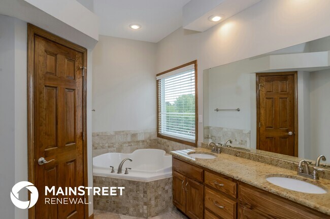 Building Photo - 5203 Woodsonia Dr