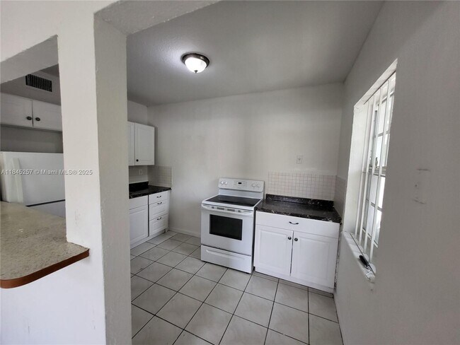 Building Photo - 5731 NW 6th Ave