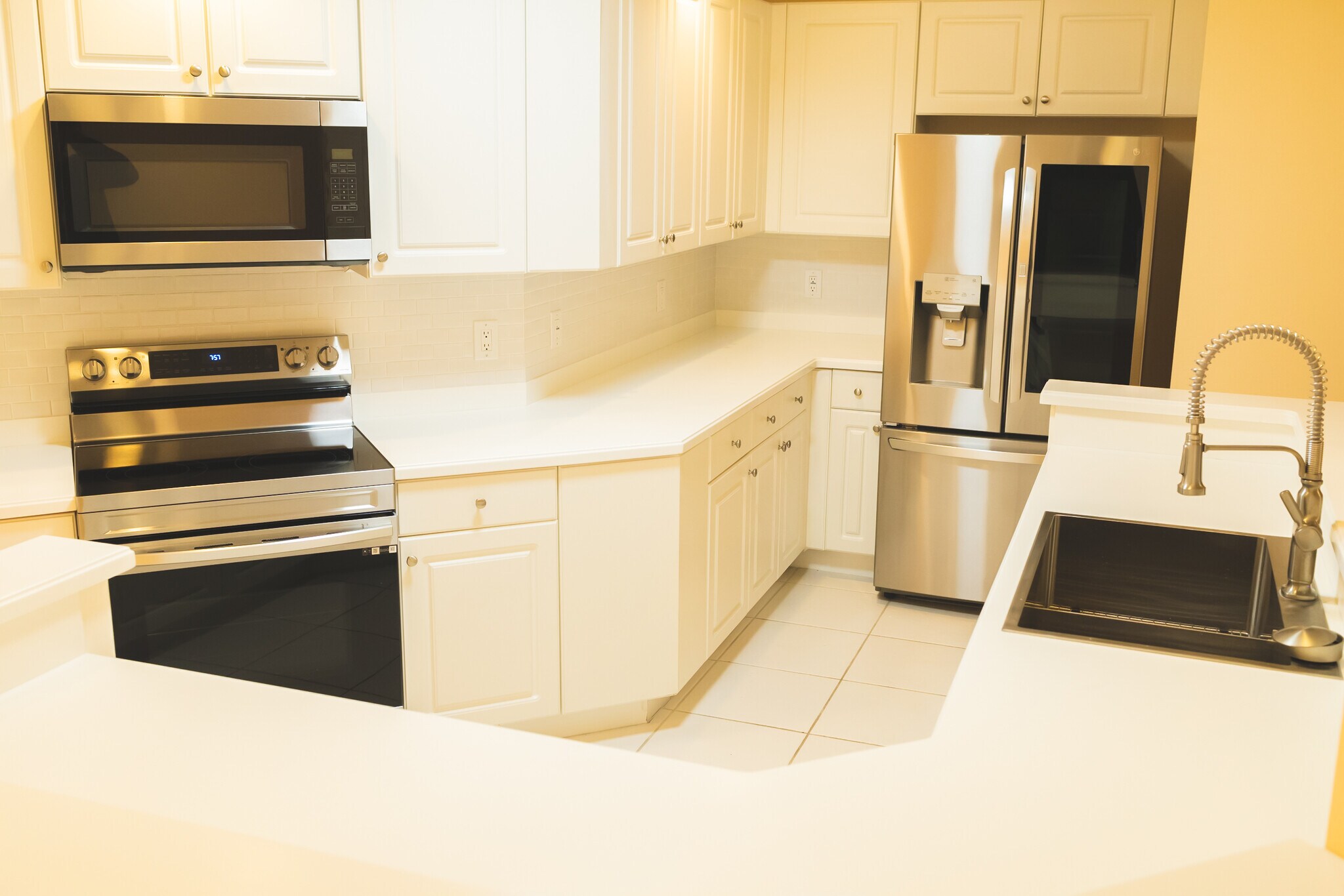 PHOTO SHOWS OLD CABINETS, NOT NEW kitchen sink is equipped with with wine glass washer - 2743 1st St
