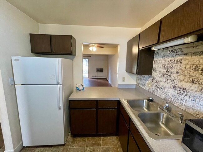 Building Photo - Beautiful Two-story, 3 Bed, 1.5 Bath Condo 1/2 Mile from CSU!