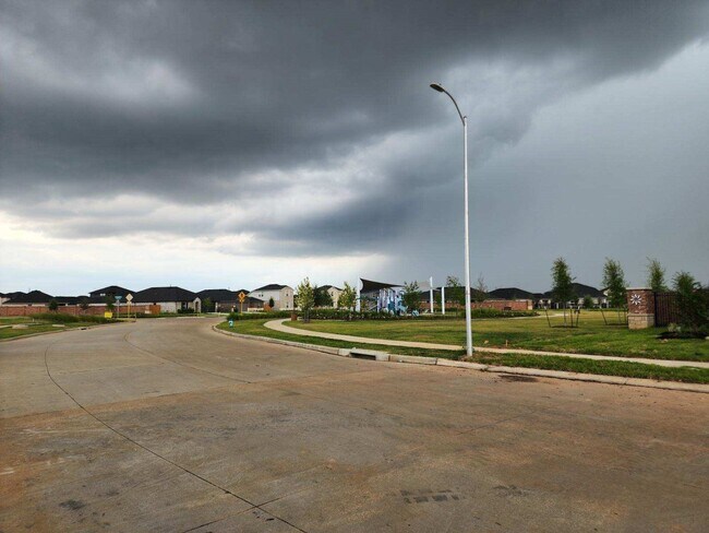 Building Photo - 27407 Sunterra Village Dr