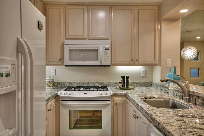 Building Photo - PRIVACY, SERENITY, AND RESORT STYLE LIVING...