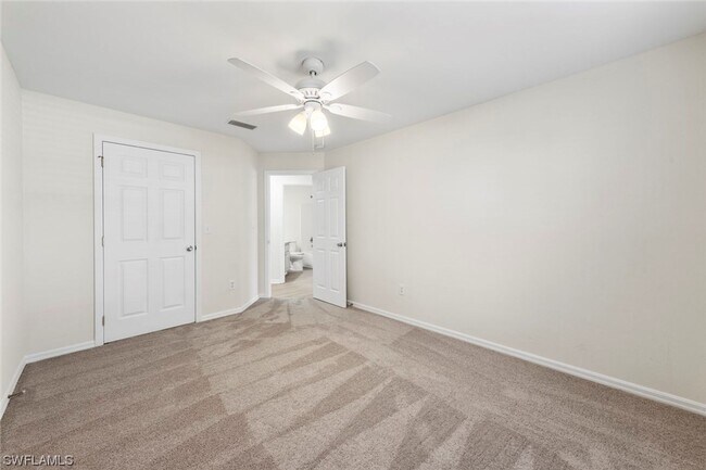 Building Photo - 4BR Home in Gated Town Lakes Community with Lake View