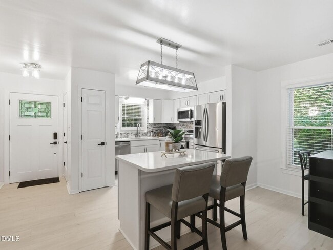 Building Photo - Updated Cary Townhome with Smart Features Near RTP & RDU