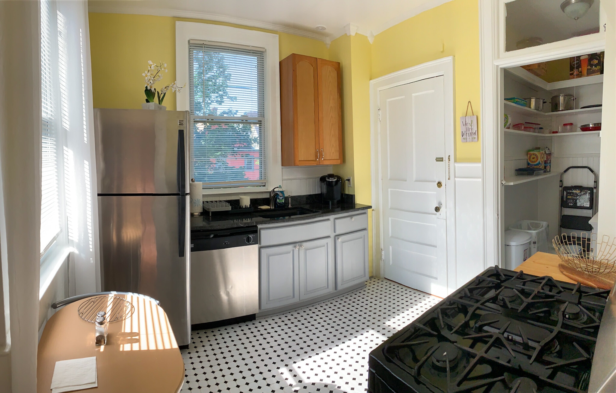 [Kitchen] Features brand new stainless steel appliances. Kitchen door leads to rear stairway. - 103 Lancaster Ave