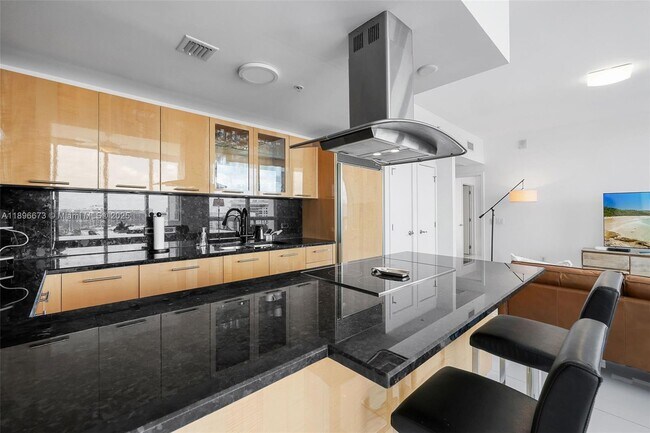 Building Photo - 6899 Collins Ave