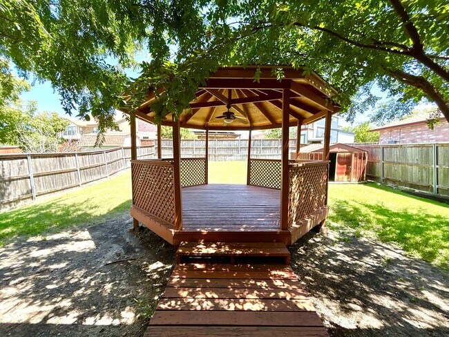 Building Photo - *COMING SOON* Energy-Efficient 4BR Home w/ Solar Panels, Loft & Backyard Oasis!