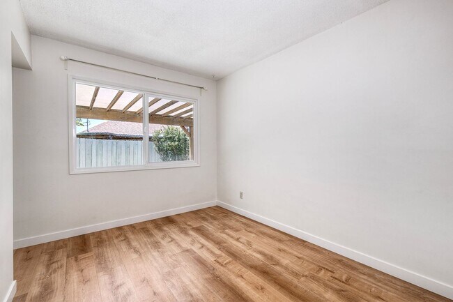 Building Photo - San Diego- Near Del Cerro - Refreshed 4 bed / 2 bath Home w/Solar ,A/C, Large Yard, Garage, and M...