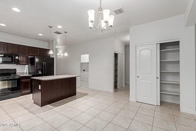 Building Photo - 23759 W Magnolia Dr