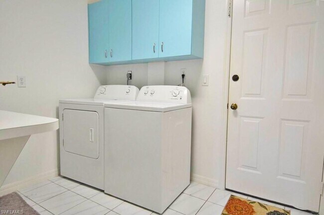 Building Photo - Spacious and Meticulously Maintained Water...