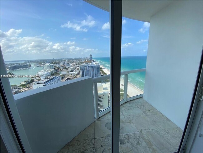 Building Photo - 6365 Collins Ave