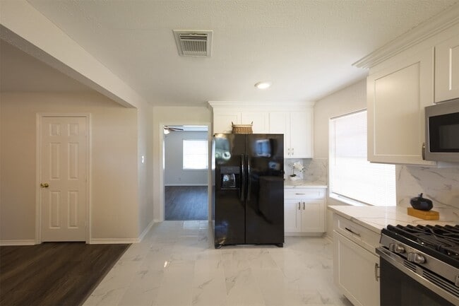 Building Photo - 7917 N Martin Luther King Ave