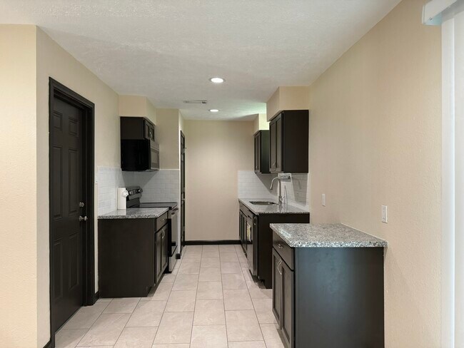 Building Photo - 16806 Tibet Rd