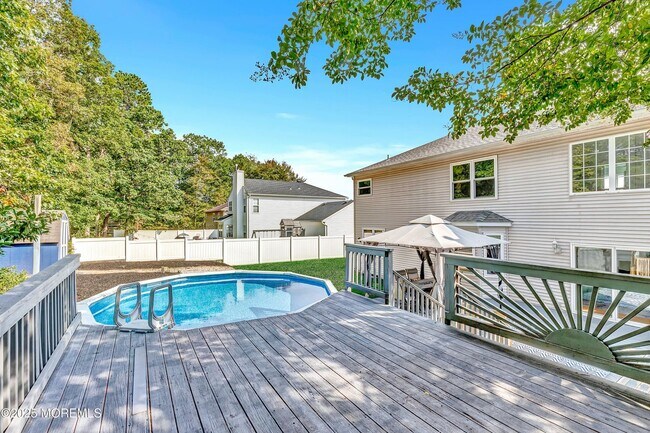 Building Photo - Spacious 4BR Colonial with Garage & Pool