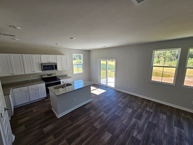Building Photo - Waterway Commons - 4 Bedroom / Single Car ...