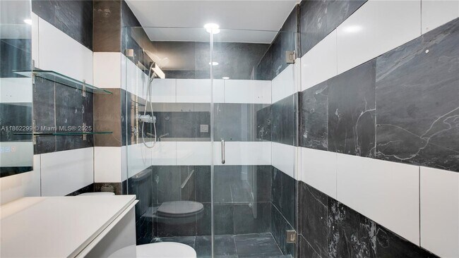 Building Photo - 5838 Collins Ave
