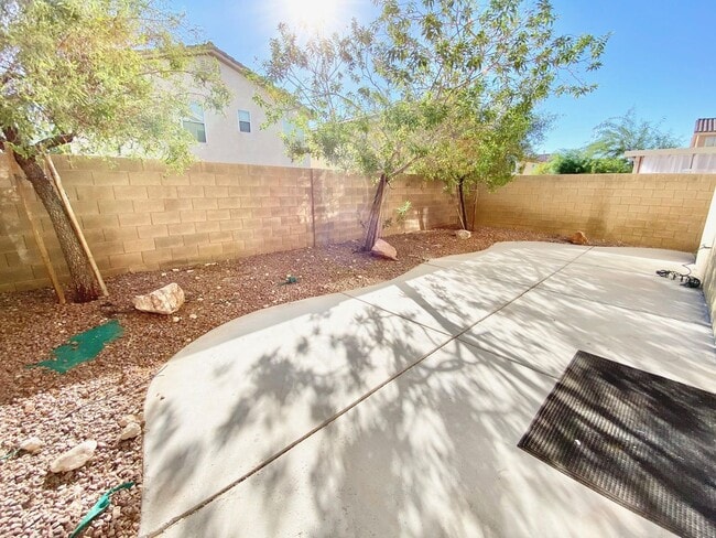 Building Photo - THIS SPACIOUS RESIDENCE FEATURES 4 BEDROOM...