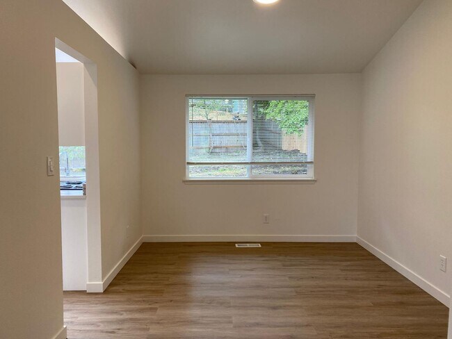 Building Photo - Stylishly Renovated Home with Private Back...
