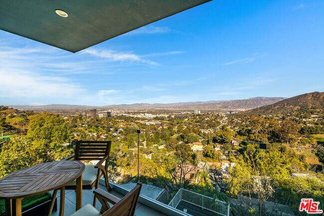 Building Photo - 7191 Pacific View Dr