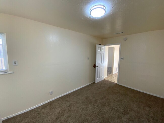 Building Photo - 4 Bedroom Single Story Home Available Near Tramway Blvd NE & Lomas Blvd NE!