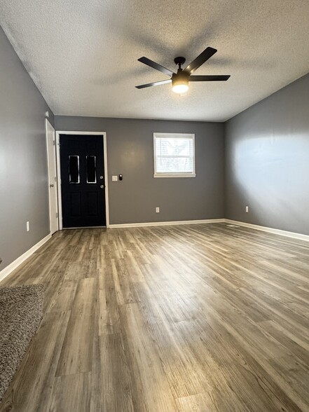 Kitchen view of living room - 518 E 97 Terrace