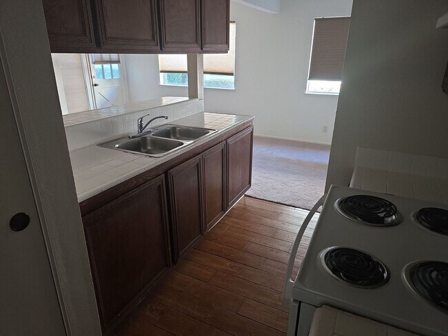Building Photo - Popular two story condo with garage