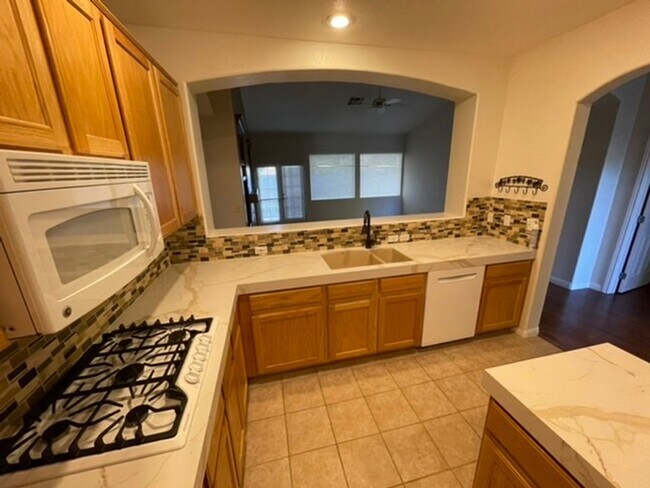 Building Photo - *WONDERFUL SINGLE STORY HOME IN GREEN VALLEY RANCH GATED COMMUNITY!!**