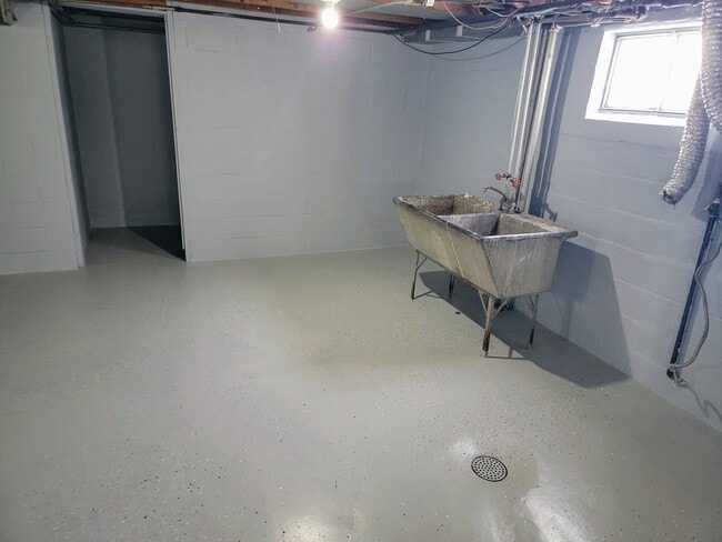 Basement with laundry area - 1713 West 58th Avenue