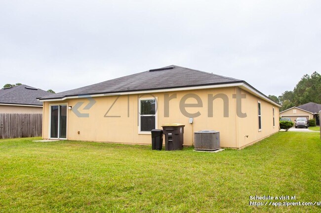 Building Photo - 15307 Bareback Dr