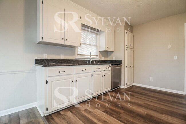 Building Photo - This lovely home is ready for your personal touch!