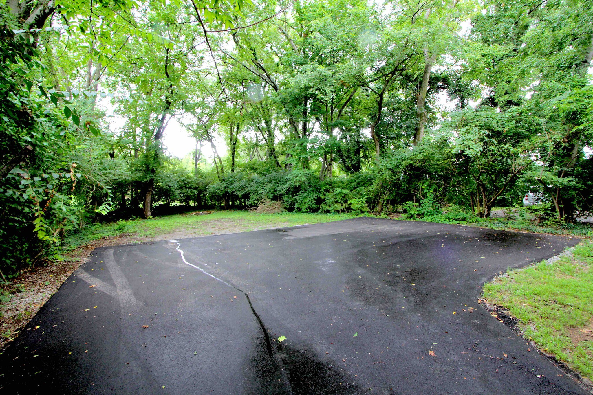 Dedicated off-street parking behind home - 1070 E Trinity Ln