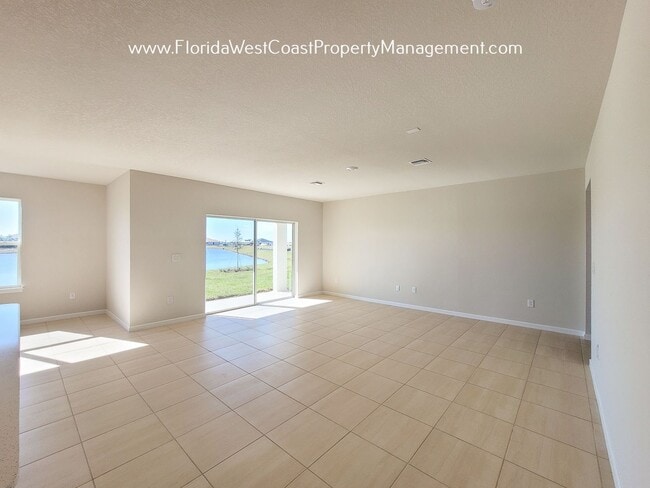 Building Photo - FANTASTIC 5 BEDROOM/ 3 BATH HOME in PARRISH! ISLES AT BAYVIEW! SUPER AMENITIES!