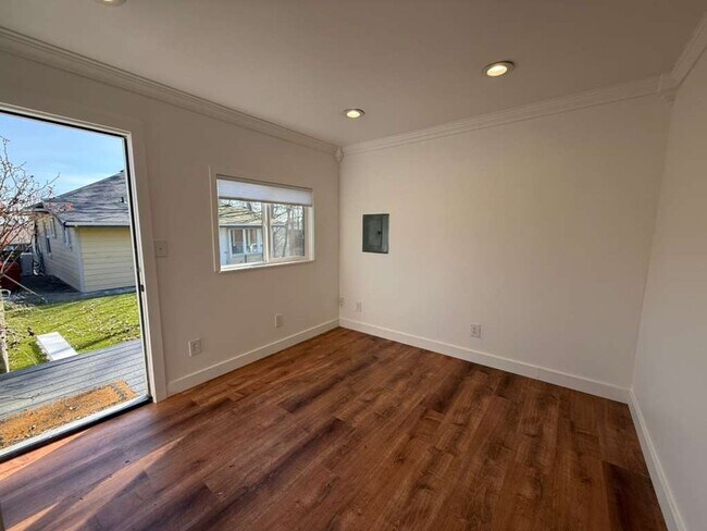 Building Photo - Two Bed 1 Bath House with Fenced Backyard!