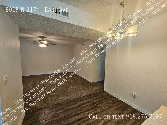 Building Photo - 8009 N 117th E Ave