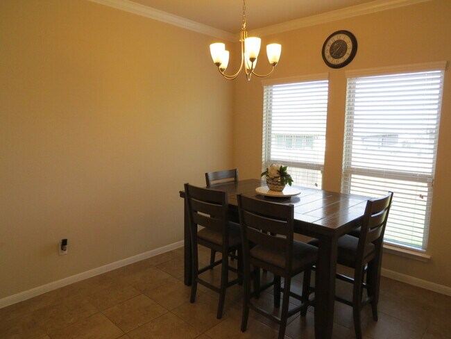 Building Photo - "Charming 4-Bed Oasis with Granite Touches...