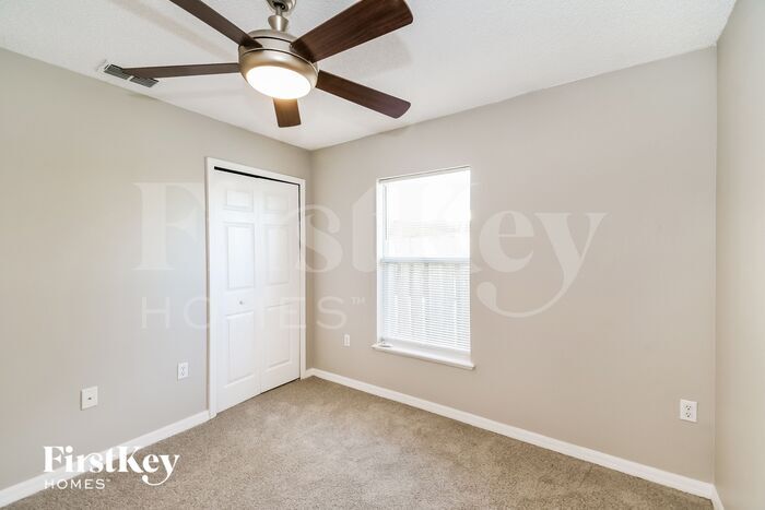 Building Photo - 6565 Gentle Oaks Dr